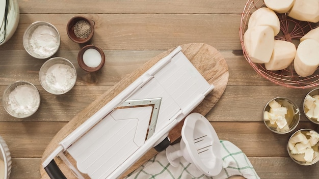 Rustic kitchen scene with hands preparing dough